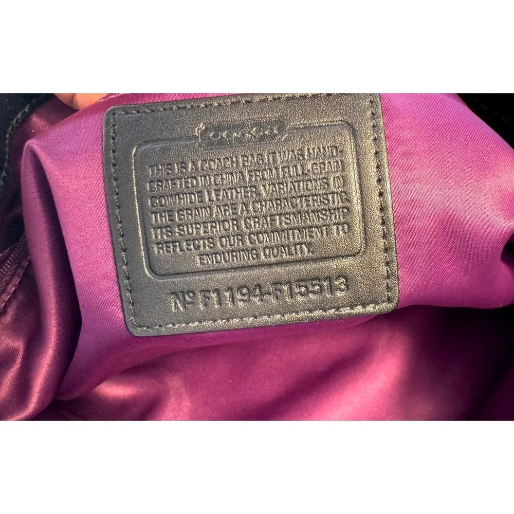 Coach Ashley soft black pebble‎ leather with 3 compartments purple fabric